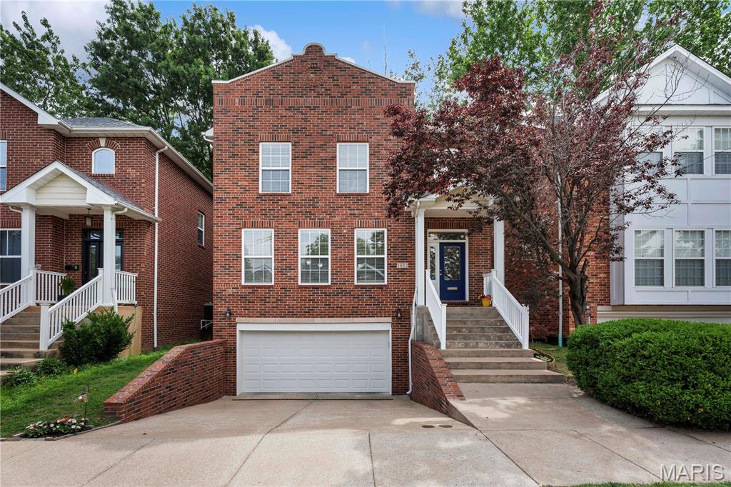 Welcome to this stunning detached 3-bedroom, 2.5-bath home in the heart of highly sought-after Dogtown!  Offering over 1,700 square feet of thoughtfully designed living space, this home combines timeless style with modern conveniences.  The open-concept floor plan features a spacious great room, dining area, and gourmet kitchen accented by gleaming hardwood floors, abundant recessed lighting, custom built-ins, a cozy gas fireplace, surround sound, elegant millwork, baseboards, and soaring 9-foot ceilings throughout the main level. The kitchen has granite countertops, stainless steel, appliances, and ample cabinetry, making it perfect for everyday living and entertaining.  The spacious primary suite offers a walk-in closet, luxurious jetted tub, and separate shower.  Additional features include fresh interior paint, main-floor laundry, generous closet and storage space, and an oversized attached 2-car garage.  Low-maintenance outdoor space with a private deck, ideal for entertaining, relaxing, and enjoying outdoor living without the upkeep of a large yard.  For those who enjoy outdoor recreation, a neighborhood park is within walking distance, providing green space for pets, children, exercise, and outdoor activities.  Ideally located near Forest Park, The Hill, major highways, restaurants, shopping, and all the amenities that make Dogtown one of St. Louis' most desirable neighborhoods. This home offers exceptional style, comfort, and convenience in a prime location.