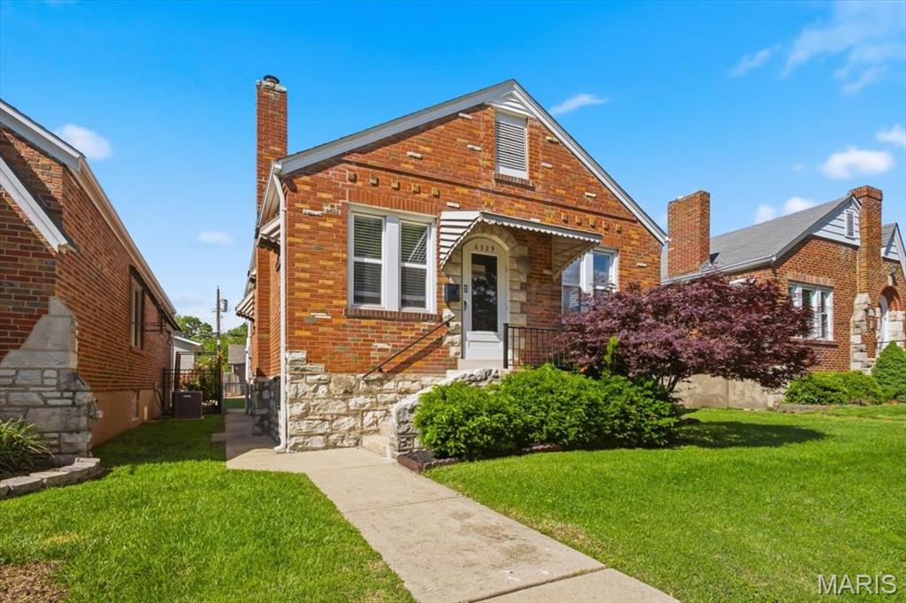 Nestled in the heart of sought-after Lindenwood Park, this beautifully updated gingerbread bungalow seamlessly blends timeless historic charm with today’s modern conveniences. Ideally located just moments from some of the city’s most beloved parks, restaurants, coffee shops, and local favorites, this move-in-ready 2-bedroom, 1-bath brick home has been thoughtfully renovated with nearly every major update already completed for peace of mind. Recent improvements include a new roof and gutters (2024), HVAC system (2023), water heater (2024), updated kitchen and bathroom, and new flooring in the back addition. From the moment you arrive, the home’s classic gingerbread masonry, charming curb appeal, and arched entryway create a warm and inviting first impression. Inside, you’ll find a light-filled living space with beautiful character, soaring vaulted ceilings, an updated kitchen featuring quartz countertops, stainless steel appliances, and premium finishes, as well as a stylishly renovated bathroom that perfectly complements the home’s original charm. The spacious, level fenced backyard offers the perfect setting for entertaining, pets, gardening, or quiet mornings with coffee, while the coveted off-street parking adds everyday convenience. Combining classic South City architecture with extensive modern updates, this Lindenwood Park gem offers the rare opportunity to enjoy historic character without sacrificing comfort or functionality. Showings start May 14th.