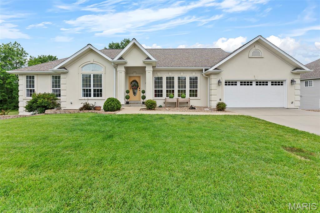 Packed with space, comfort, and versatility, this home offers exceptional value! With FIVE bedrooms and the potential for a SIXTH bedroom in the basement workshop/hobby area, there’s room for everyone. The home features THREE full bathrooms, TWO gas fireplaces, soaring ceilings, and abundant natural light throughout. The kitchen includes a pantry and breakfast area that flows seamlessly to the well-maintained deck. The finished basement is designed for entertaining with a cozy family room, wet bar, and walkout access to the patio. Outside, the beautifully fenced backyard provides the perfect backdrop for relaxing evenings, grilling, and gathering with friends and family.