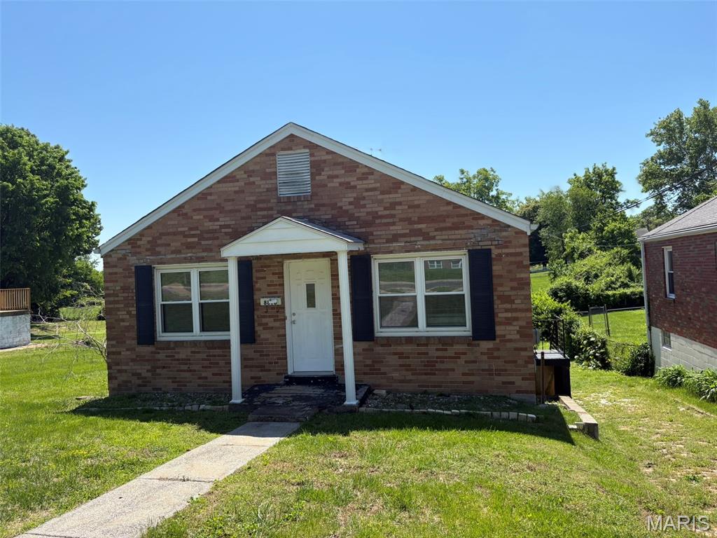 Investor special with strong upside potential! This 2-bedroom, 1-bath brick bungalow features hardwood floors, a functional layout, walk-out basement access, and a large finished lower-level room offering additional living space possibilities. Property offers excellent rental or fix-and-flip potential with cosmetic updates and repairs. Discoloration is present in the lower-level finished area and buyers are encouraged to complete any inspections they deem necessary. Conveniently located near Jennings High School, shopping, and major roadways. Property being sold AS-IS; seller to make no repairs or inspections.