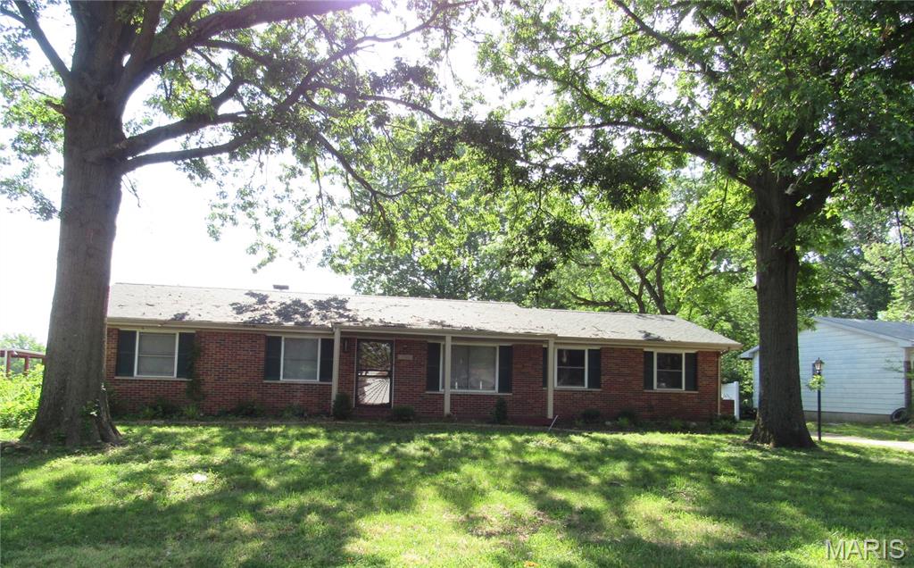 The wood floors in this home have been professionally refinished, granite countertops, newer roof, fencing, AC, furnace, water heater and garage door and remote, enjoy the covered patio off the dining area. There are two rooms finished in the basement. Earnest money deposit is 1% of purchase or $1000, whichever is greater. Buyer and buyer's agent to verify all MLS information including measurements.