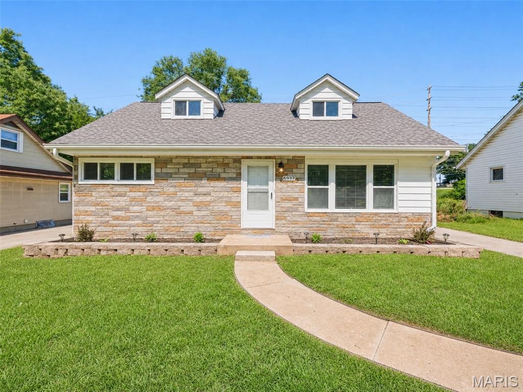 Don't miss this incredible opportunity to own a beautifully remodeled 4-bedroom, 2-bath home with features that are hard to find in the area! From the moment you arrive, you'll appreciate the extensive updates, including a brand-new roof, gutters, soffit, and fascia, along with low-maintenance vinyl siding for lasting curb appeal. Inside, the home blends modern updates with timeless character, featuring original hardwood floors that have been carefully preserved and restored. The spacious floor plan offers plenty of room for family and guests, while the completely updated eat-in kitchen is sure to impress with white cabinetry, granite countertops, and brand-new stainless steel appliances. The full basement provides endless possibilities for storage, a workshop, recreation space, or future expansion. Step outside to enjoy the large, level, private backyard, perfect for entertaining, gardening, pets, or simply relaxing. With 4 bedrooms, 2 full baths and extensive renovations, this move-in-ready property is a true must-see. Schedule your showing today before this exceptional home is gone!