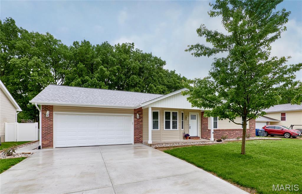 Welcome Home! This move-in-ready gem in the heart of St. Peters offers the perfect blend of style, comfort, and convenience. Extensively renovated from top to bottom, this home features Simonton double-hung windows, new exterior doors, updated lighting, and Fanimation ceiling fans. Step inside to a bright, open floor plan with vaulted ceilings that create a spacious, inviting feel. The seamless flow between the kitchen and living areas makes everyday living and entertaining effortless. The impressive list of exterior updates—including an upgraded driveway, sidewalk, siding, and windows—adds both curb appeal and peace of mind. Inside, the living room is filled with natural light, while the beautifully updated kitchen showcases shaker cabinetry, granite countertops, and stainless steel appliances. Both main-level bathrooms have been thoughtfully refreshed with updated vanities, countertops, and stylish tile finishes. Step outside to your private backyard retreat—fully fenced with mature landscaping and a spacious patio, perfect for relaxing or entertaining. Conveniently located just minutes from shopping, dining, entertainment, and major highways, this home truly checks every box. Don’t miss your opportunity—schedule your showing today