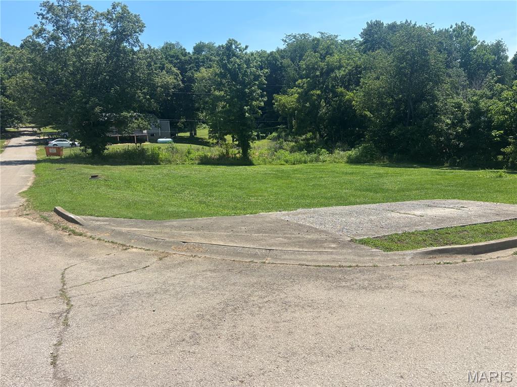 Excellent opportunity to own a corner lot in the heart of Marquand with easy access to some of the area's best outdoor recreation. This open, level lot offers an ideal location for building your dream home, weekend cabin, or investment property. Conveniently located near the local school and within city limits, the property has access to city utilities, making development simple and affordable.

Outdoor enthusiasts will appreciate the property's close proximity to the beautiful Castor River, offering opportunities for fishing, floating, swimming, and relaxing along the water. The area is well known for SXS and ATV riding, with numerous trails and scenic backroads to explore. Nearby government-owned land provides thousands of acres for public hunting, camping, hiking, wildlife viewing, and outdoor recreation.

Whether you're looking for a residential building site, a weekend getaway basecamp, or an investment in a growing recreational area, this property offers an excellent combination of convenience and outdoor adventure.