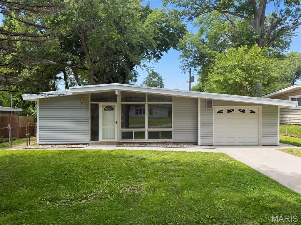 Check out 1015 Robinwood Dr, recently enhanced with fresh interior paint and partial flooring replacement for an updated appeal. The kitchen features an accent backsplash, complementing the outdoor patio area. The property includes a practical storage shed and a fully fenced in backyard. This home provides updated comfort and practical appeal. Included 100-Day Home Warranty with buyer activation