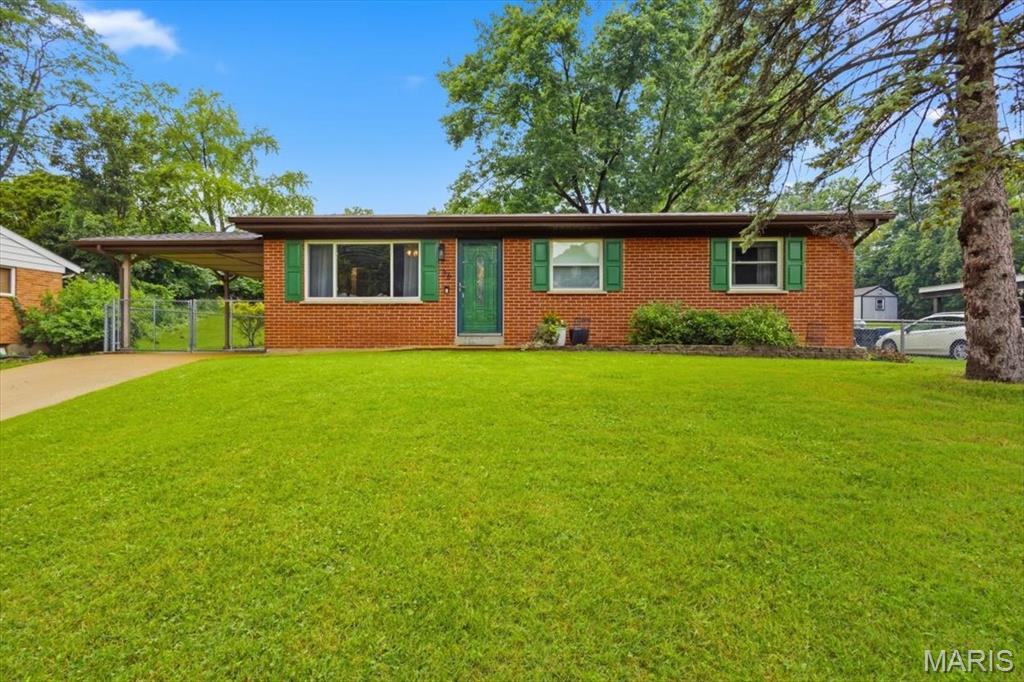 Welcome home to this 3 bedroom, 2 full bath ranch situated on over a quarter acre with a large, fully fenced backyard. As you step inside, you'll notice the beautiful wood flooring in the family room, abundant natural light from the large front window, and neutral paint colors throughout.

Enjoy the gorgeous eat-in kitchen featuring plenty of cabinet and counter space, stainless steel appliances, granite countertops, and a spacious breakfast room.
The beautiful full hall bathroom offers an updated vanity and modern light fixtures. Your primary suite includes a closet, an updated private bathroom, and charming shiplap detail. Two additional main-floor bedrooms complete the main level.
Head downstairs to the partially finished basement, perfectly set up for entertaining! This versatile space features an entertainment room, a full bar, and an additional living room, offering plenty of room to gather and relax.

Step outside to enjoy the large backyard with a gorgeous patio and plenty of privacy. Don't miss the opportunity to make this your new home!