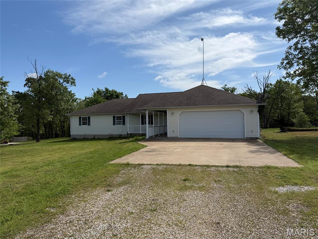 Spacious 4-bedroom home offering over 2,200 finished square feet with a functional floor plan and plenty of potential. The inviting covered front porch welcomes you inside, where you'll find a large kitchen, formal dining room, and an additional flex space that can serve as a family room, home office, or second dining area. The primary suite features two closets and an en-suite bath with a dual vanity and jetted tub/shower combination. The level backyard provides ample space for outdoor enjoyment. The home is in need of cosmetic updates and repairs and is being sold as-is, making it an excellent opportunity for investors or buyers looking to add their own personal touches. With solid square footage and a desirable layout, this property offers great value and endless possibilities.