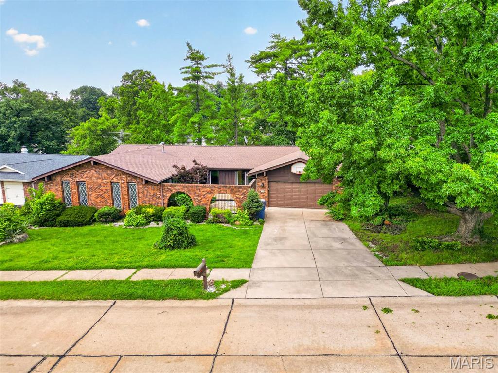 Public open house 7/12 from 1-4. This beautiful 5-bedroom ranch home is being sold in “As Is” condition. The seller is out of town and unable to make repairs found in the inspection period. The main floor was updated with Brazilian Cherry hardwood floors. There is a primary bedroom with an ensuite bathroom and two other bedrooms and an additional full bathroom on the main floor. Downstairs is a walkout recreation room and two more bedrooms with a full bath. There are over 3,000 square feet. The neighborhood has a swimming pool, tennis court, and a pond to enjoy fishing. Glan Tai is in the award-winning Parkway West school district. There is easy access to shopping and highways to get you downtown and to the airport in less than 30 minutes. Any offers are due by 3:00 7/13. Response time 6 p.m. 7/14.