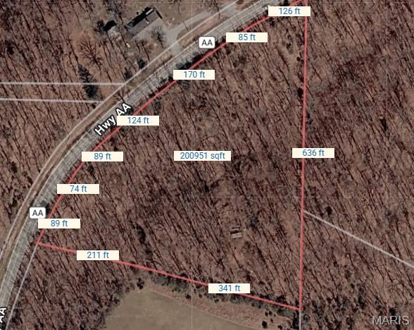 Perfect piece of land! No restrictions or subdivision rules here. Buildable lot you have been looking for. The shed on the property will be removed before closing. It's really hard to find something like this anymore. 5 Acres just off the Highway with easy access to all the intown attractions, yet far enough for serenity and peace of mind. Make it the way you want it. Electric is right there to hook up to and it's right off Highway AA, just past Huntington as you approach from Hwy 67 and Hwy H it will be on your left of Hwy AA. It has over 750 feet of road frontage. Pie wedge shaped lot. More photos coming.