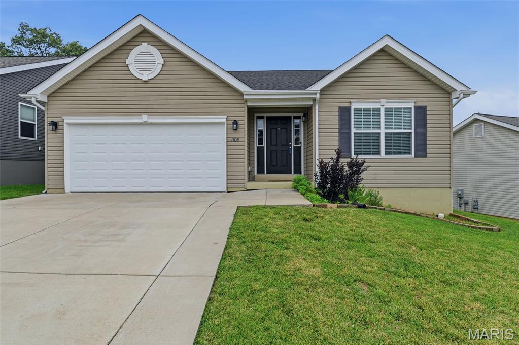 Welcome to this beautiful and updated home in the Huntington Glen subdivision. This 3 bedroom, 2 bathroom home includes many updates since it was built. The upgrades include a luxury kitchen with 42" soft-close cabinets, oversize island, custom backsplash, white marble countertops, stainless steel appliances, beverage refrigerator and a walk-in pantry. The living area is an open floor concept with vaulted ceilings and upgraded hardwood floors. The primary bedroom features a walk-in closet and a full bathroom with shower. Two additional bedrooms, a full bathroom and laundry room complete the main level. Freshly painted walls and ceilings truly make this home move-in ready. The unfinished basement is roughed in for a full bathroom, and includes an egress window for a future bedroom and plenty of storage space. Additional upgrades include a new roof (2025) and extended driveway. The backyard backs up to trees that can be enjoyed from the covered patio. Schedule your private showing to experience this beautiful home for yourself.