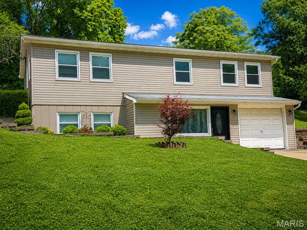 Welcome home to this charming split-level property located in the highly desirable New Haven School District! Offering just over 1,000 square feet of living space, this 3-bedroom, 2.5-bath home combines modern updates with the opportunity to add your own finishing touches.

The home features several important improvements, including a newer HVAC system installed in 2023, a new water heater in 2024, and updated 200-amp electrical service. The partially remodeled interior provides a great blend of updated spaces while still allowing room to personalize the master bedroom, bathroom, and sunroom to your taste and potential for a buyer to build some instant equity with a few upgrades.

Additional features include an all-electric setup, single-car garage, off-street parking, and a spacious backyard perfect for entertaining, pets, or outdoor activities.

Conveniently located in the heart of New Haven, this property offers comfort, functionality, and value with plenty of potential for its next owner.  Home to be sold AS-IS.  Seller to make no repairs.  Don’t miss your opportunity to make this home your own — schedule your showing TODAY!