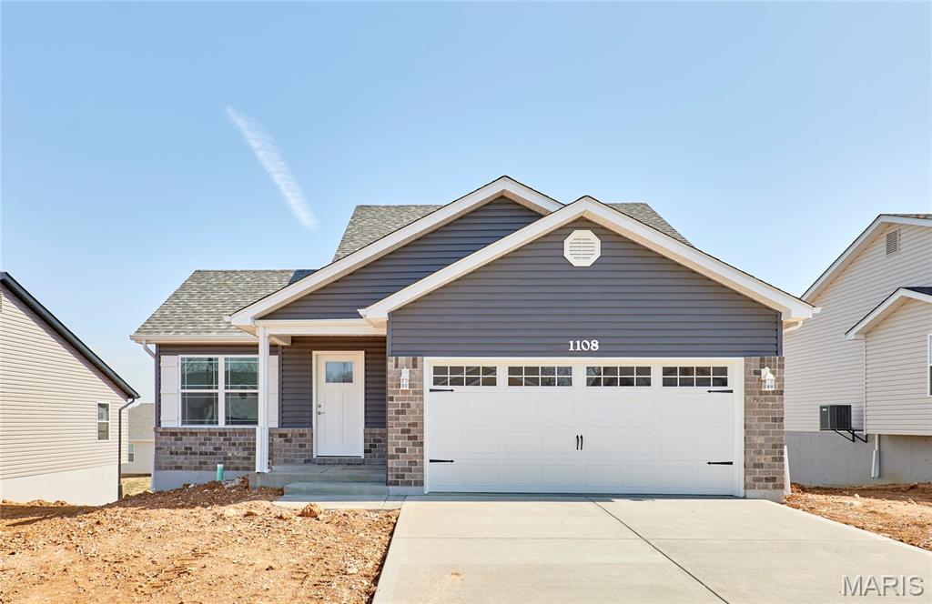 BRAND NEW home with every option you could imagine! They include vaulted ceilings, rounded “bullnose” corners, granite or quartz countertops, stainless steel appliances, 42" cabinets with "cushion close", custom neutral-colored paint job throughout, LVT flooring throughout most of the home, framed windows, taller baseboards, adult-sized cabinets in bathrooms with marble countertops, walk-in closets, upgraded carriage garage doors with openers on 2 CAR Garage, full bath rough-in, panel doors (many varieties), and upgraded water/light fixtures throughout the house! Second FLOOR laundry! Fully sodded yard (front/sides/back). *Pictures are of previously built homes. Builder/Broker* This home is USDA eligible.
