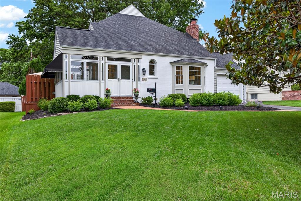 OPEN HOUSE FOR SATURDAY HAS BEEN CANCELLED. Timeless charm meets modern luxury in this beautifully updated home, ideally situated on a picturesque tree-lined street. Thoughtfully renovated throughout, this residence offers the perfect blend of classic character and today's most desired amenities.

The welcoming enclosed front porch opens to elegant living and dining spaces featuring rich hardwood flooring, detailed millwork, and abundant natural light. The stunning kitchen is designed for both everyday living and entertaining, boasting custom cabinetry, quartz countertops, premium stainless-steel appliances, a center island, marble backsplash, and a charming built-in window seat.
The spacious primary suite serves as a private retreat with a luxurious spa-inspired bath complete with a dual-sink vanity, oversized walk-in shower, separate soaking tub, and a generous walk-in closet. Just beyond the primary suite, an inviting loft offers a versatile bonus space perfect for a home office, nursery, reading nook, playroom, or private sitting area. Additional bedrooms provide comfortable accommodations with beautifully updated baths throughout.

The finished lower level significantly expands the home's livability, offering an impressive recreation area ideal for movie nights, game days, a home gym, play space, or office setup. A full bath and dedicated laundry room with utility sink add convenience and flexibility.
Step outside to your own private outdoor retreat, where the expansive deck creates the perfect setting for dining, grilling, and entertaining, offering a seamless extension of the home's inviting living spaces. The backyard provides exceptional usable outdoor space and endless possibilities for recreation, entertaining, and everyday enjoyment.

Combining extensive updates, versatile living spaces, designer finishes, and exceptional outdoor amenities, this remarkable home offers a rare opportunity to enjoy both comfort and style in a highly desirable setting. A truly special place to call home.