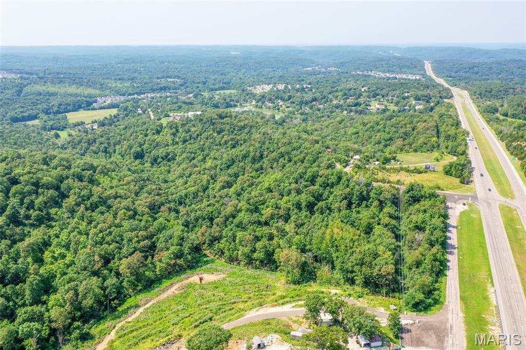 Rare opportunity to acquire 50.65 Acres of Land in Jefferson County. 

The site consists of 4 parcels and has an approved PUD (formed in 2003) for 40 Buildings consisting of 8 units each for a total of 320 units. There is a sewer line expansion project underway which will provide sewer access to the site. Jefferson County has a 5.3% average vacancy rate for multi-family.

The site is located in House Springs off of Hwy-30 at Carol Park Road.