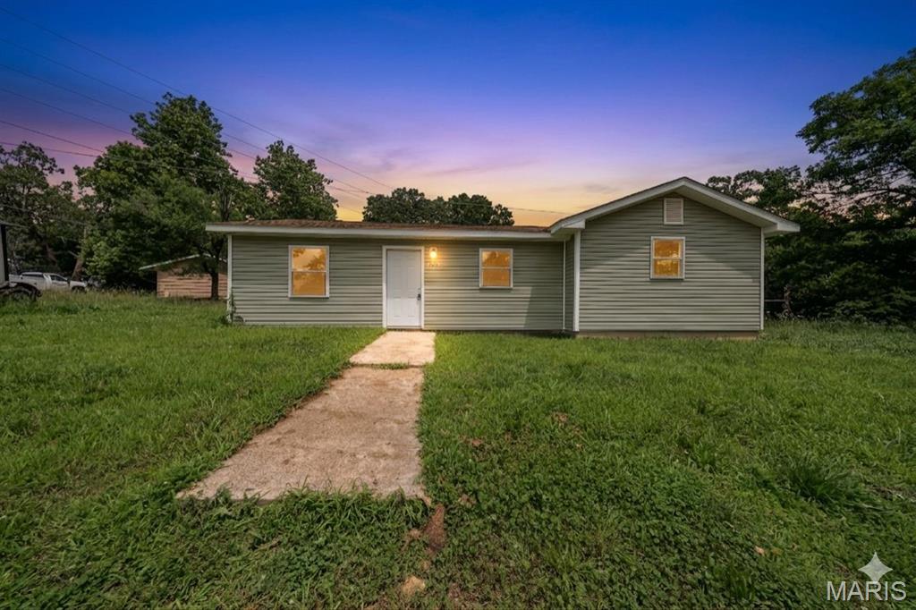 Beautifully updated 3 bedroom, 2 bathroom home on a 0.13-acre lot m/l in St. Robert! Just minutes from Ft. Leonard Wood, this property features luxury vinyl plank flooring, a charming eat-in kitchen with durable wood cabinetry and sleek stainless steel appliances, and a centrally located hall laundry for convenience. The primary suite includes a full en-suite bathroom, while a large back deck provides a perfect spot to enjoy the level backyard. Previously generating $1,300 per month in rental income—this is an excellent investment opportunity! You don't want to miss this!  Schedule your private showing soon!
