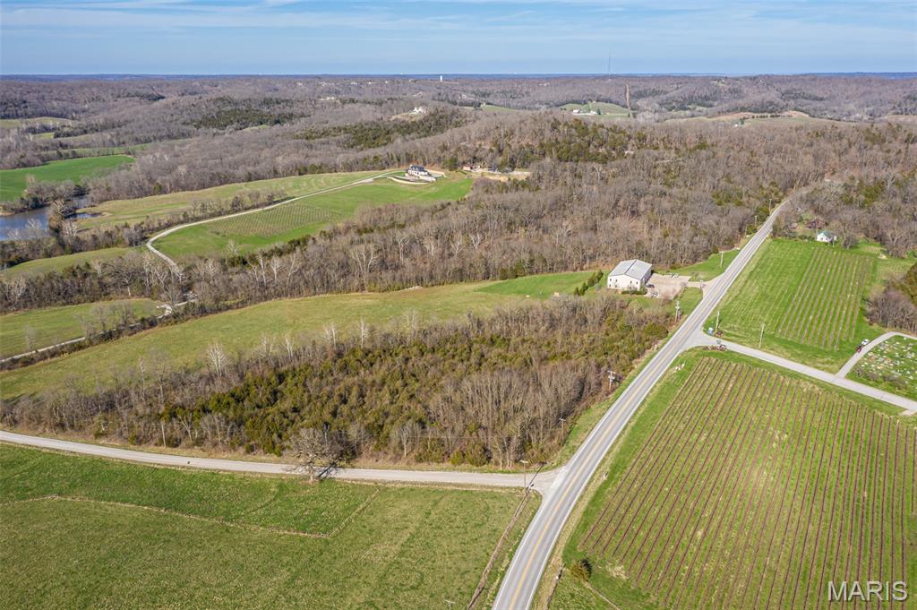 3 access points...Hwy 94, Nahm Rd & Schindler Rd. Public water available. Owner will consider dividing. One of a kind find.