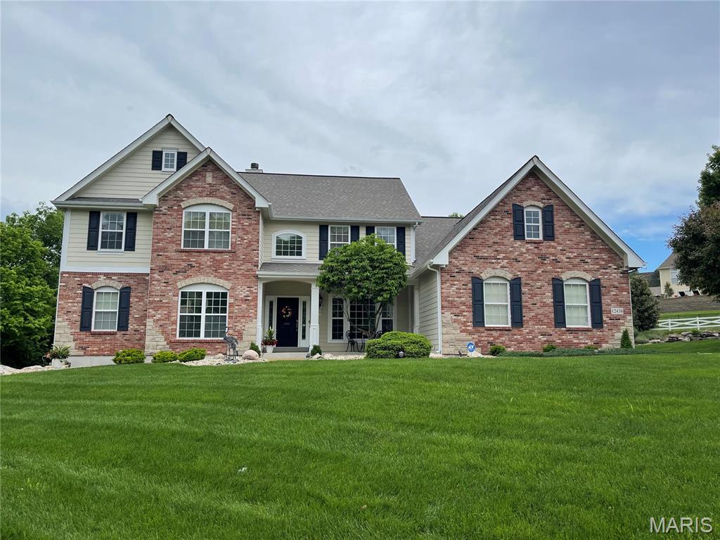Welcome to this spectacular 5BR home in sought-after Sunset Hills, where elegance meets comfort! Step inside to beautiful h/w floors, 9ft ceilings & crisp white 6-panel doors. The gourmet kitchen is a chef's dream w/42" staggered cabinets w/crown, granite, stone backsplash, large island w/breakfast bar & Bosch SS appls w/gas range. Enjoy the cozy hearth room w/2nd f/p! The soaring 19ft great rm dazzles w/palladium windows, gas f/p & recessed lighting, while the formal dining room boasts treyed ceilings & wainscoting. A main-floor office w/crown is perfect for work-from-home & the marble foyer makes a grand impression! The main-level primary suite offers bay windows, his/hers walk in closets, spa-like bath w/dbl vanity, sep tub & shower & tile floor. Upstairs: 3 beds, 3 full baths & a loft area! The fin LL adds living space w/wet bar, 5th BR, full bath, storage, dual HVAC sys (new in 2019) & 2 water heaters. Enjoy outdoor living on the maint-free deck w/stone pillars & lighting system!