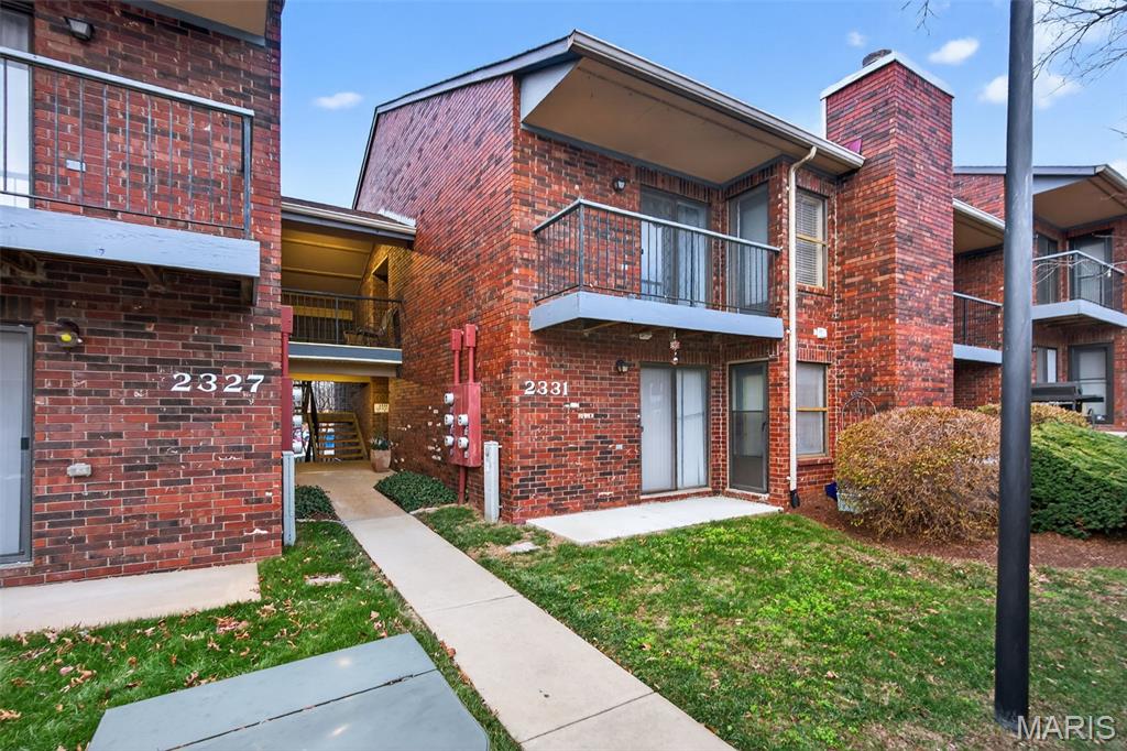 Welcome home to this beautifully updated, move-in-ready garden-level condo offering the perfect blend of comfort, privacy, and convenience. This thoughtfully designed 2-bedroom, 2-bath floor plan features dual primary suites, each with its own private en-suite bath—ideal for roommates, guests, or anyone seeking flexible living space.

Fresh interior paint creates a bright, modern atmosphere throughout the home. The inviting living room is anchored by a cozy fireplace and flows seamlessly into the spacious kitchen, where a center island provides the perfect spot for casual dining, meal prep, or entertaining.

Enjoy the rare convenience of direct access to the private outdoor space from both bedrooms as well as the living room, creating an effortless indoor-outdoor lifestyle with multiple private entry options.

Located in desirable St. Louis County, this condo offers easy access to shopping, dining, parks, and major highways, making everyday living both convenient and connected. Combining a functional layout with stylish updates and an exceptional location, this is an opportunity you won't want to miss.

Listing agent has an ownership interest in the property.
