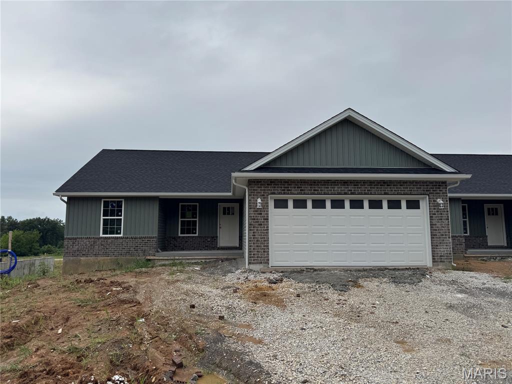 Close in 30 days! Almost finished. Welcome to Grindstone Grove in Moscow Mills. Beautiful under construction ranch villa/duplex located on a nice lot has all the bells and whistles. Each home is designed for personal privacy, loaded with high quality finishes, and built by one of the best custom builders in the area. Your next home is 1216 sq ft, 3 bedroom, 2 bathroom, oversized two car garage and full walkout basement. The custom type finishes include granite countertops, stainless steel appliances, luxury vinyl plank flooring in main living area, spindled staircase railing, vaulted living room and kitchen, large center island, ceiling fans in all bedrooms and living room, can style lights, brush nickel finishes including shower door in master, and much more. Grindstone Grove is just off quiet Railroad Street with high speed Gateway Fiber internet, no monthly HOA fee, new concrete streets, street lights, and will have sidewalks throughout for homeowner safety. Home qualifies for zero down USDA, zero down VA, & FHA. Agent owned. Add a 12x12 treated wood deck for a total purchase price of $286,000. Railroad Street in front of Grindstone Grove will be resurfaced very soon.