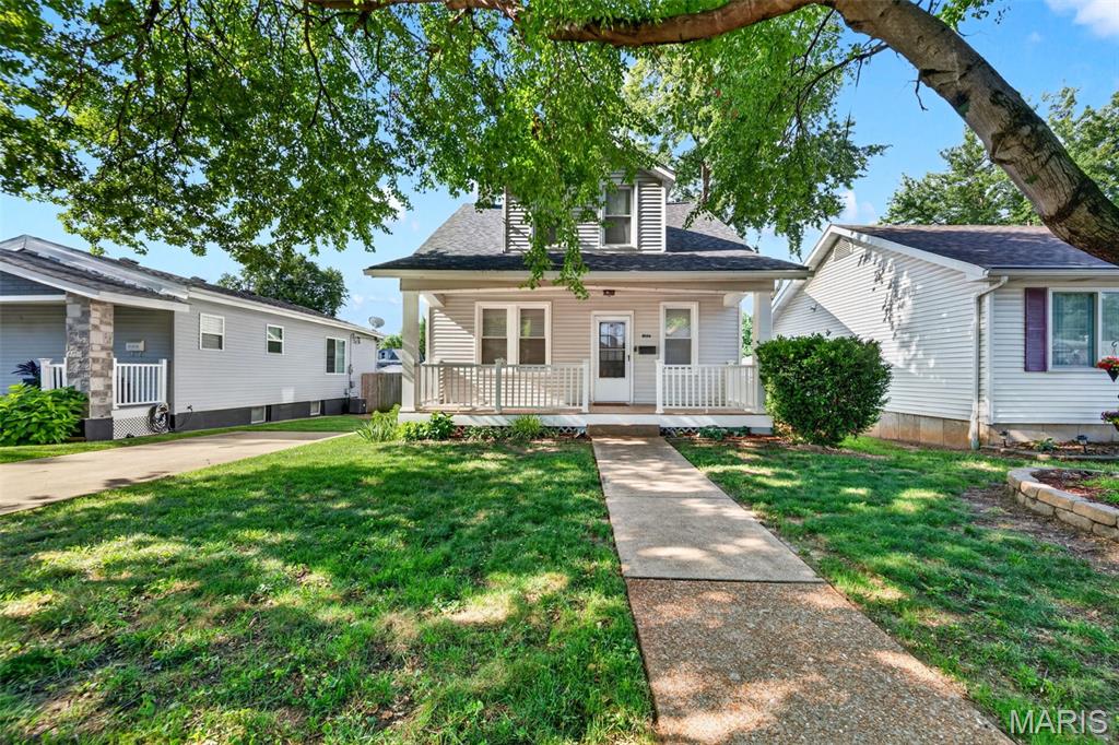 Charming and spacious 3-bedroom, 2-bath home ideally situated on a quiet, tree-lined street in one of South City's most desirable neighborhoods. A welcoming covered front porch adds to the home's timeless curb appeal and provides the perfect place to enjoy your morning coffee. From the moment you step inside, you'll find an abundance of natural light and inviting living spaces designed for everyday comfort and effortless entertaining. The spacious main level includes a full bathroom and a recently updated kitchen featuring new stainless steel appliances, new quartz countertops and quartz backsplash. Upstairs, you'll find a spacious primary bedroom with two closets, two additional bedrooms and a second full bathroom.  
The outdoor space is truly a standout feature. Step onto the large deck overlooking an expansive, fully fenced backyard with endless possibilities for hosting summer barbecues, gathering with friends and family, gardening, playing with kids and pets, or simply unwinding after a long day. This kind of outdoor space is a rare find in the city, while still being in the heart of everything South City has to offer. Off-street parking with a private driveway adds even more convenience.
Enjoy an unbeatable walkable lifestyle just steps from Tilles Park, where you can take advantage of walking trails, playgrounds, and tennis, pickleball, and basketball courts. You'll also be within walking distance of neighborhood favorites like Biggie's, Menya Rui, Zoe’s, Mestiza, and Knead, while grocery stores, shopping, and everyday conveniences are all just minutes away.
Additional recent improvements include a new roof, gutters, soffit, fascia, and flashing (2024), a new sump pump (2025), and passed St. Louis City Occupancy providing added peace of mind.