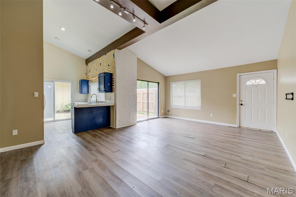 Low maintenance living at its best— this single-story end unit checks all of the boxes! This 2-bedroom, 2-bath patio home lives large with everything on one floor — no stairs, no shared walls above or below. Enjoy your own large private fenced courtyard, abundant natural light from extra end-unit windows, and a peaceful wooded backdrop across from your oversized 2-car garage. With 1,092 sq ft, low-maintenance living has never looked better. Priced to allow the new owner to add their personal touch with flooring and cosmetic updates — a fantastic opportunity to build instant equity in a sought-after St. Charles location!