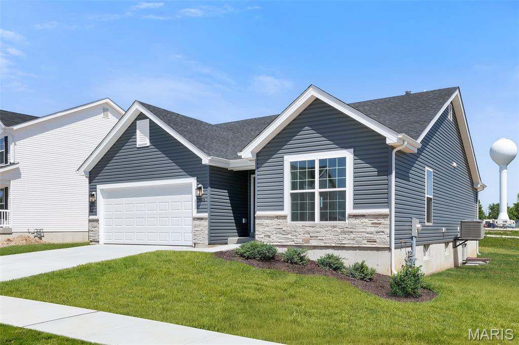 New McBride Homes Aspen ranch 3BR, 2BA is ready now! Features include an open floor plan w/vaulted ceilings, great room w/ceiling fan, & wood laminate flooring throughout the main living areas. The kitchen has Benton Sarsaparilla 42” cabinetry, quartz countertops, peninsula w/extended breakfast bar, stainless steel GE appliances & sliding glass door to backyard. The primary suite has a ceiling fan, walk-in closet, private bath w/dual sink vanity & 5ft walk-in shower. 2 extra bedrooms & full bath add convenience. Upgrades include 6ft windows, lighting/plumbing fixtures, ceiling fan prewires, 1st floor laundry, garage coachlights & 2 panel white interior doors. The lower level has a ¾ bath rough-in for future finish. Boone Ridge is the perfect blend of suburban convenience & small-town charm with 64 homesites just minutes from local dining and entertainment. Enjoy peace of mind with McBride Homes’ 10 year builders warranty & incredible customer service! Similar photos shown.