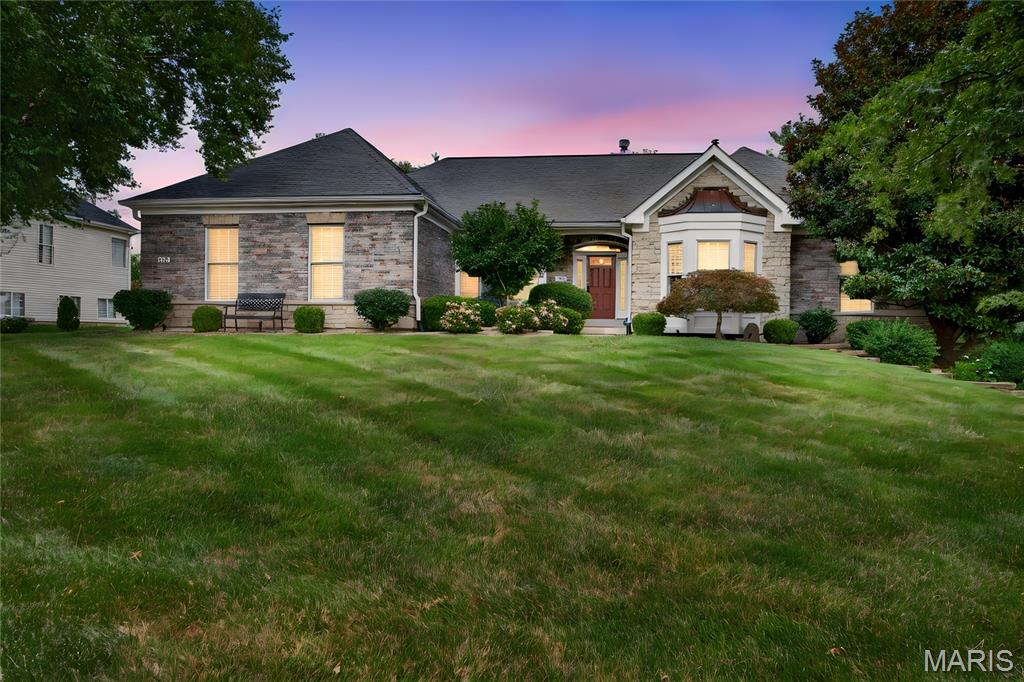 Luxury Living with 6 Bedrooms, 3.5 baths, Finished Lower Level & Resort-Style Community Amenities
Welcome to this beautifully appointed ranch home offering 6 spacious bedrooms, 3.5 baths, and an exceptional floor plan designed for both everyday living and effortless entertaining. Nestled on a quiet cul-de-sac in the sought-after Lake St. Louis community, this home combines timeless elegance with modern comfort.
The heart of the home is the expansive eat-in kitchen featuring granite countertops, a large center island, stainless steel appliances, abundant cabinetry, and easy access to the lush backyard—perfect for outdoor dining and relaxing.
The impressive great room is filled with natural light from a dramatic wall of windows and features a cozy wood-burning fireplace framed by custom built-in shelving. A formal dining room provides the perfect setting for holiday gatherings, while a separate main-floor office offers a quiet workspace for remote professionals.
The spacious Primary Suite is a true retreat, complete with French style sliding glass doors leading to a private backyard patio, an oversized walk-in closet, and a luxurious ensuite bath featuring dual vanities, a soaking tub, and a walk-in glass surround shower.
Two additional main-floor bedrooms share a convenient pass through full bath, and main floor laundry room and mudroom area in the oversized 3 car garage add everyday functionality and convenience.
The finished lower level expands your living space with three additional bedrooms (one currently serving as a home office), a second kitchen with full size refrigerator, wine cooler, sink and microwave, media room, game room, full bath, and an abundance of storage—ideal for multi-generational living, guests, or entertaining.

Highlights at a glance include:
6 Bedrooms | 3.5 Bathrooms
Oversized 3-car garage
Large mudroom area in garage 
Oversized driveway with ample parking
Full second kitchen
Wood-burning fireplace
Built-in shelving
Granite countertops
Stainless steel appliances
Lush private backyard with patio
Extensive storage throughout
As a resident, you'll enjoy Lake St. Louis community amenities, including lake rights, a community pool, tennis courts, clubhouse access, and all the lifestyle benefits this premier neighborhood has to offer.
This exceptional home offers the perfect blend of space, comfort, and resort-style living—all in one of Lake St. Louis' most desirable locations. Close to shopping, restaurants and all the lake life fun you can handle!