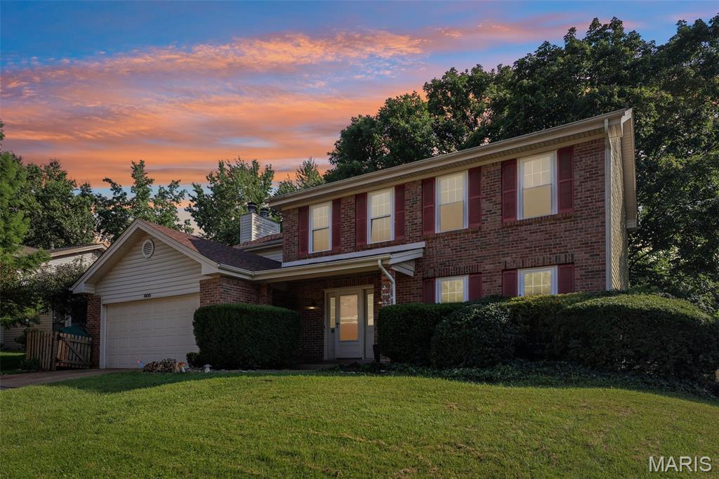 Welcome home to this beautifully updated home in the heart of Ballwin, offering the perfect combination of comfort, style, and convenience! The inviting kitchen features granite countertops, white cabinetry, recessed lighting, open pantry shelving, a GE stainless steel refrigerator, and plenty of workspace for everyday living and entertaining. Warm and inviting living spaces are highlighted by two wood-burning fireplaces, creating the perfect atmosphere year-round. You'll appreciate the durability and modern appeal of wood laminate flooring throughout, replacement windows, six-panel doors, a convenient main-level coat closet, and the peace of mind of a newer architectural shingle roof. The finished lower level expands your living space with a large recreation room complete with a bar—ideal for entertaining friends and family—plus a generous storage area to keep everything organized. You will love the vaulted owners suite with a cozy wood burning fireplace! Step outside to enjoy the level backyard featuring a newer privacy fence, a spacious screened-in covered deck, providing multiple outdoor spaces to relax, grill, or entertain in any season. Located in a highly desirable Ballwin location with quick access to Big Bend Blvd, shopping, grocery stores, restaurants, and major highways, this move-in-ready home offers the convenience you've been looking for. Be sure to check out the 3D virtual tour and floor plan before scheduling your private showing!