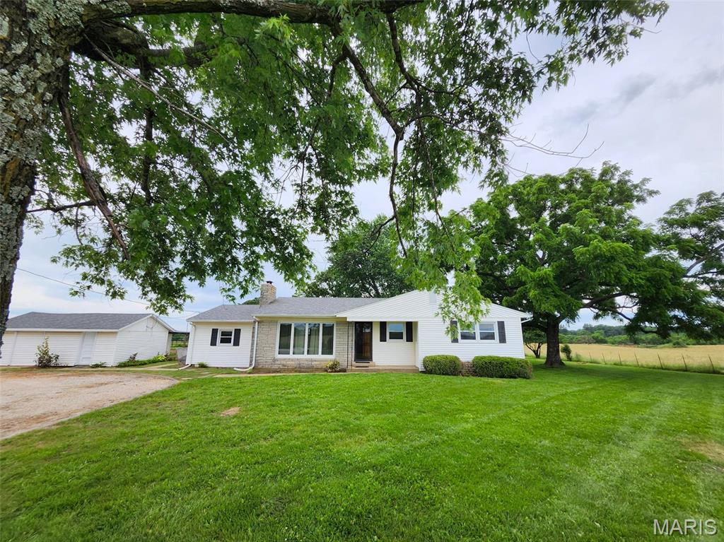 Discover your dream Homestead just minutes north of Mountain Grove, Mo 65711. Situated within the highly desirable Mountain Grove school district, this exceptional property offers the perfect blend of country freedom and town convenience. This property offers 3 Acres M/L, 3 Bed, 1.5 Bath,30x40 shop,30x50 open barn with pipe fencing corral, enclosed barn with chicken house and a small storage building with a covered patio. New roof in 2017. Come give this Beauty a look you and your family will not be disappointed.