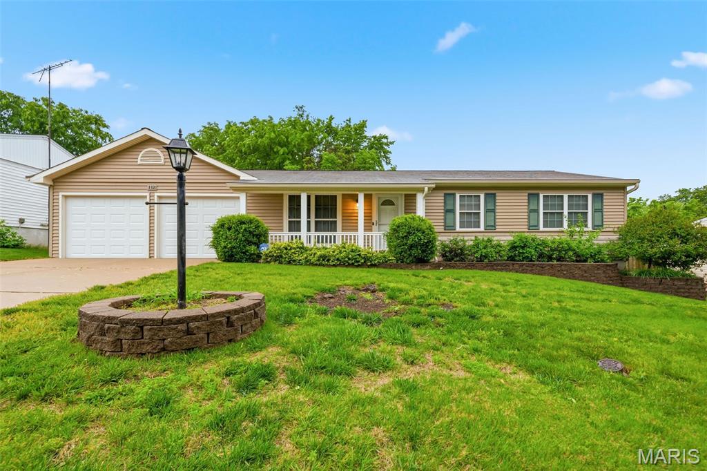 Charming and move-in ready ranch in desirable O'Fallon! This 3 bedroom, 2 bathroom home offers comfortable living space, a walkout lower level, and an oversized heated garage with incredible storage potential. The updated kitchen features pull-out drawers, tile backsplash, crown molding, and refrigerator that stays! The kitchen opens to the dining area creating a functional everyday living and entertaining space, while the breakfast room includes recessed lighting and a ceiling fan.
The spacious living room features brand new carpet and plenty of natural light. All 3 bedrooms are conveniently located on the main level and share a full hall bathroom. The unfinished walkout lower level is ready for you to finish to suit your needs.  The finished full bathroom has already been done for you.  Plus there is a slider door access to the patio and backyard.
Enjoy outdoor living with a wood deck perfect for summer cookouts, entertaining, or relaxing under the mature trees. The fully fenced backyard offers privacy and room to play. Car enthusiasts, hobbyists, or anyone needing extra storage will love the oversized heated garage with room for extra-long vehicles, lawn equipment, and more. Conveniently located just off Hwy K near shopping, restaurants, parks, and everyday amenities with easy access to I-70 and 364. Located in highly rated Fort Zumwalt School District West schools! Don’t miss this opportunity to own a well-maintained ranch in an established neighborhood — schedule your showing today!
