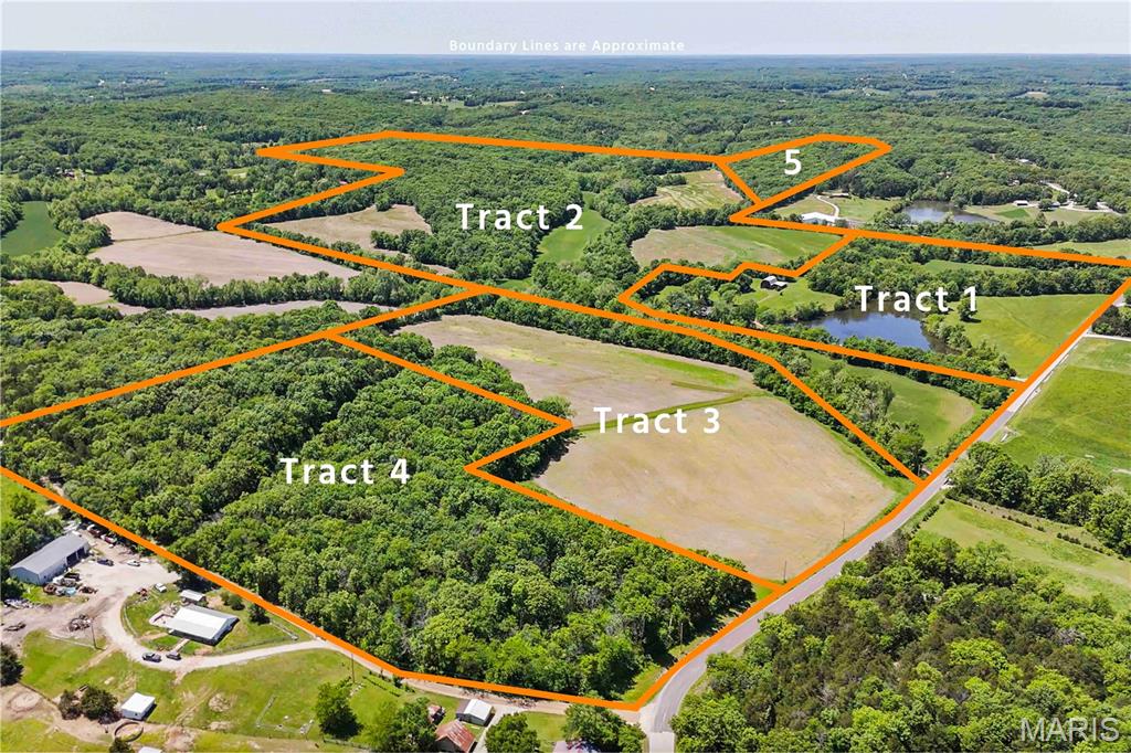 AUCTION LISTING - List price is not indicative of Seller’s final reserve amount.  This property is part of an online bidding event.  This sale will be executed with a no-contingency contract provided by the brokerage representing the Seller. See MLS Supplement Document for complete details.  

In 1951, Albert and Iva Sauls purchased this farm and built a life on it with their own hands. Albert felled trees from the property, milled them into lumber, and raised a chicken coop, corn crib, silo, and barn. He poured the foundation for the farmhouse himself and framed it with timber from the land and salvaged boxcar lumber. Around 1958, the dam and pond were added, turning the farm into the family's recreational hub for generations of Wehling holidays and gatherings. After Albert and Iva passed, the family leased the cropland to neighboring farmers and continued using the place as their gathering ground. Now the next chapter belongs to someone new.

Offered in five tracts totaling approximately 230.32± acres, the property combines productive ground, strong recreational features, and a settled homestead. Farm Service Agency figures indicate 76.68 acres of productive cropland, with soils composed primarily of Useful, Haymond, and Union silt loams. The brick ranch home offers three bedrooms, one bath, a basement with a bath, a one-car attached garage, and an attached four-season room. The home is solid and ready for updates. Older outbuildings remain on site, reflecting the farm's working history.

A stocked three-acre lake holds catfish, bass, and crappie, and a rock-bottom creek winds through the property, complementing excellent hunting and recreational ground. Frontage on hard-surfaced Krenning Road provides easy access. The farm lies two miles northeast of Beaufort, fifteen minutes west of Union, and forty-five miles from Chesterfield Valley.