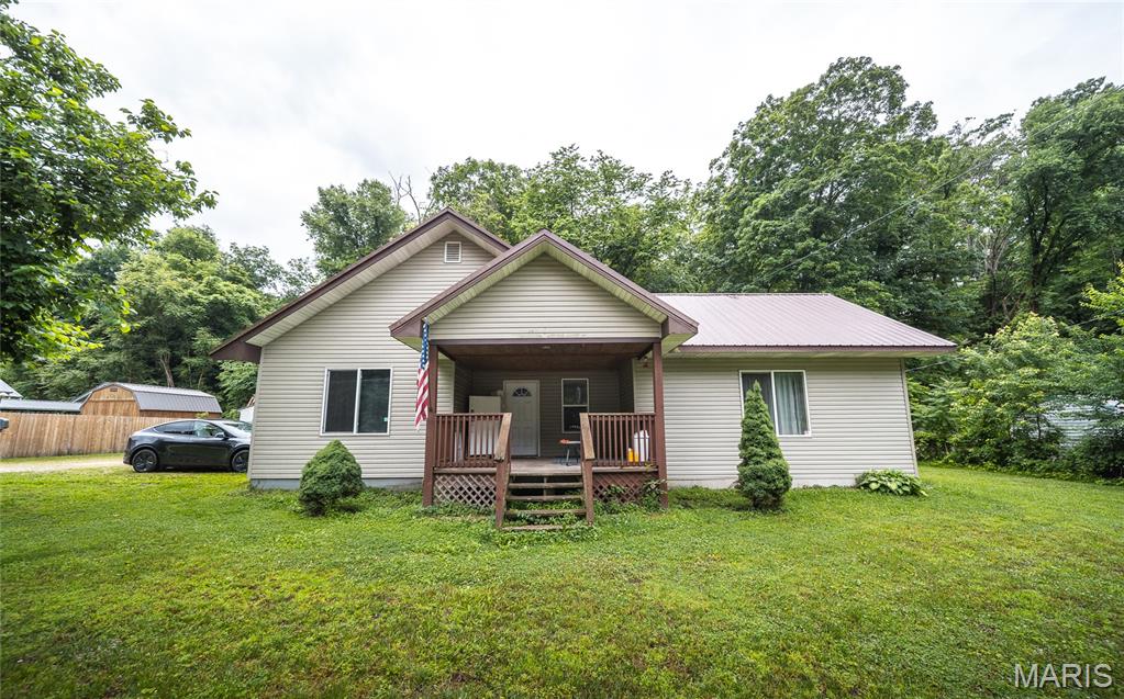 Located in the heart of Newburg, this 4-bedroom, 3-bath home is full of character, potential, and opportunity. Whether you're an investor searching for your next project, a homeowner looking to build equity, or someone who appreciates the charm of older homes, this property offers a solid foundation to bring your vision to life. From the moment you arrive, the inviting covered front porch welcomes you in and sets the tone for the warmth and personality found throughout the home. Inside, you'll discover spacious living areas and a layout that offers plenty of flexibility for modern updates while preserving the property's unique charm and character. With a little TLC and creativity, this home has the potential to become something truly special. Outside, the detached garage and additional carport provide valuable storage and parking options, making the property both practical and versatile. The yard offers room for gardening, outdoor entertaining, or simply enjoying the peaceful small-town setting. Conveniently located near local amenities and with easy access to surrounding communities, this property presents an excellent opportunity for investors, renovators, or buyers looking for a home they can personalize over time. Homes with this much potential and character don't come along every day. Bring your ideas, your toolbox, and your imagination—this Newburg property is ready for its next chapter. Schedule your private showing today and discover the possibilities waiting inside!