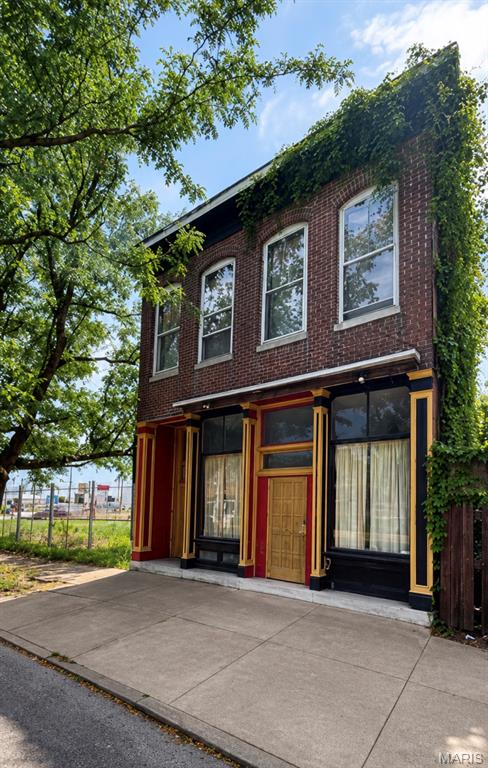 **Investment Property** Property has been commercial, retail,and residential(duplex). Needs work. Currently set up as townhome or duplex. Great open floor plan on first floor.  Fenced back yard (appox. 25' x 50') behind building with small patio/porch and brick fireplace. Space has great potential for retail, studio, office, or other purpose. Convenient metered and unmetered street parking in front of building.  Be a part of the historic Carondelet renaissance. Location: City, High Traffic