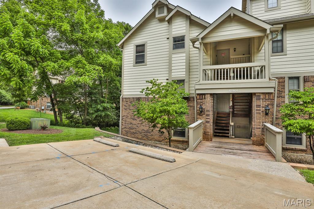 Completely updated beautiful 2 Bedroom, 1 bath Condo in the Parkside Condo community !! LOW HOA ~ $300 Monthly
Rose Acres Elementary, Holman Middle School, Pattonville HS. New Laminate flooring throughout, brand new baseboards,New Ikea Modular in 2nd bedroom, USABLE and inspected wood burning Fireplace, Updated LED lighting in kitchen, main living room and bedrooms. 
2024~ New stove/oven with air fryer and warming drawers, new microwave, new dishwasher, new refrigerator, new countertops, new kitchen sink and faucet, new garbage disposal, new cabinet hardware including soft close drawer guides. 
Bathroom~ new countertop, sink, faucet, medicine-cosmetics cabinet, mirrors, door with full length mirror, 
Shower insert 2020
Furnace 2023, AC 2023, Water Heater 2023, 
Washer, Dryer and Refrigerator stay
This Condo Community has a clubhouse and pool. Unit walks out to a beautiful patio with a private backyard. Lawn and wooded view. The Unit is on the ground level and requires you walk down a short flight of stairs.  1 Carport space and plenty of extra parking in front of the Unit. This is Condo is nestled among trees in a beautiful part of Maryland Heights!