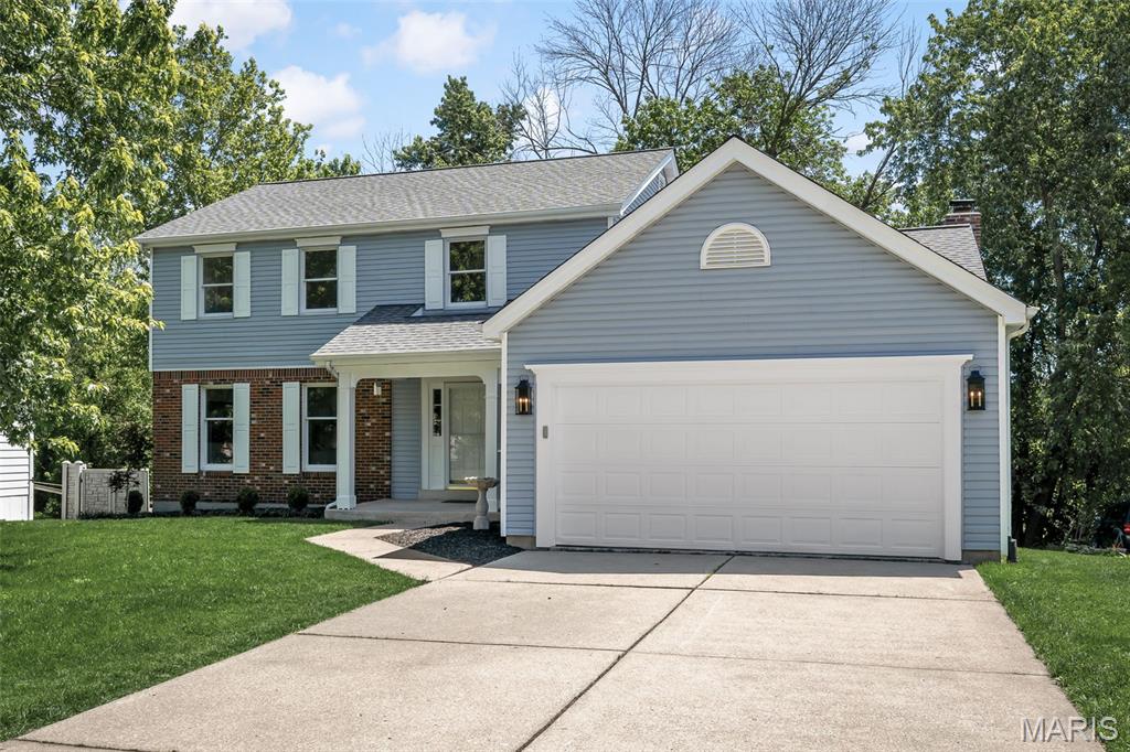 This lovely two-story home features a complete interior refresh, with new flooring and a crisp palette that maximizes natural light throughout. The inviting foyer displays glass French doors leading to a home office or secondary den, situated across from the formal dining room. The kitchen is appointed with quartz countertops, a large pantry, and an eat-in dining space that overlooks the oversized composite deck and private, tree-lined backyard. When the leaves fall, you'll enjoy seasonal views of the neighboring pond and wildlife. The sunken living room features a beautiful brick fireplace with a new wood-burning firebox, flanked by built-in bookcases. A butler’s bar completes the space and makes entertaining effortless. A spacious laundry room with cabinetry completes the main floor. Upstairs, retreat to the primary suite featuring a walk-in closet and a separate soaking tub and shower, along with two additional bedrooms and a full bathroom. The clean and dry unfinished basement awaits your personal touch. For ultimate peace of mind, a state-of-the-art HVAC system was installed in 2024, complete with a UV light air filter, humidifier, and smart thermostat.