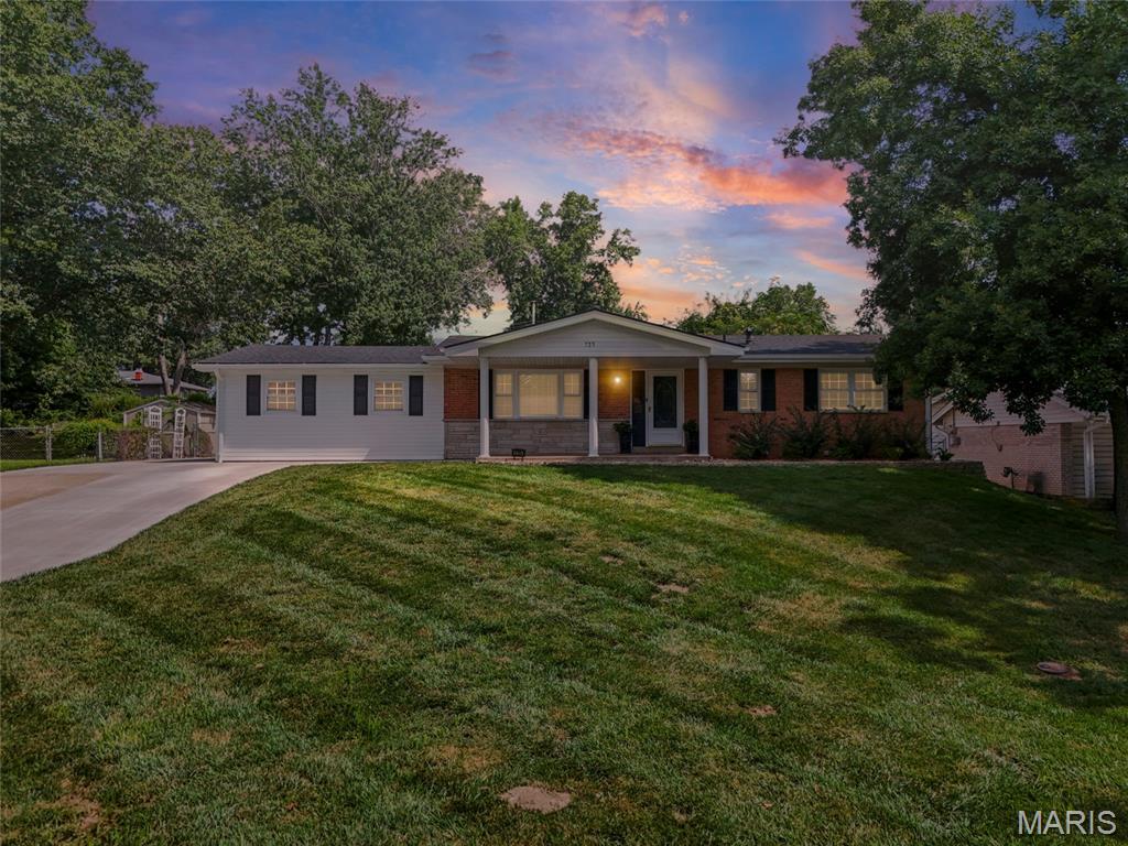 OPEN HOUSE SUNDAY 1-3PM!! A rare blend of modern updates, flexible living space, and standout outdoor amenities make this beautifully renovated 4-bedroom, 4-bathroom, property a must-see. The open floor plan creates a bright, spacious feel that is ideal for a large family, multi-generational living, or families with kids, offering three living rooms and an office area for plenty of room to gather, work, play, or relax. With two primary bedroom suites, one upstairs and one downstairs, the layout offers exceptional flexibility for guests, extended family, or added privacy; the downstairs suite also features a luxurious bathroom with an elegant Onyx shower for a spa-like retreat. Enjoy peace of mind with major updates already completed, including a new roof, siding, rock walls, carpet, luxury vinyl plank flooring, paint, trim, and fixtures, plus a home warranty plan for added confidence. Dual HVAC systems provide added comfort and help maintain balanced temperatures throughout the home. The home also offers the added convenience of two laundry rooms, one upstairs and one downstairs, making everyday living easier for busy households. The kitchen brings a fun, stylish retro vibe together with stainless steel appliances and abundant pantry space, creating a space that feels both nostalgic and functional. Step outside to a huge patio made for gatherings on the 1/3 of an acre lot, complete with space for a firepit, barbecues, and relaxing evenings in the 8-person hot tub featuring lights, jets, and a new cover for the perfect place to unwind or entertain. Conveniently located close to shopping, restaurants, and quick access to Highway 70, this home offers both daily convenience and a smooth commute. With thoughtful renovations throughout and inviting indoor-outdoor living spaces, this move-in-ready home is ready to welcome its next owner.