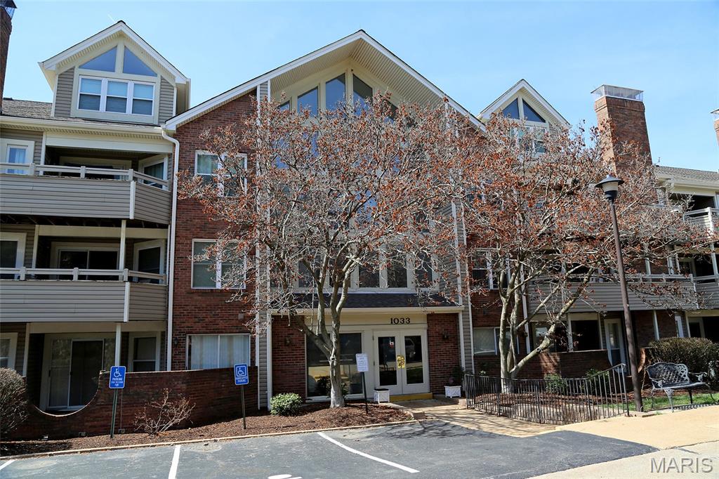 This well maintained 2 bedroom 2 bath condo in sought-after Briarcliff Condo in popular Ladue School; It offers comfortable life style and convenience to all major highway, shopping, restaurants and parks; Open floor plan leads to sizeable living room with wood burning fireplace & adjacent dining room which has a sliding door to wrapped wood deck.  Relax on the deck for morning coffee and overlook the common ground with breathtaking view;  Primary suite with walk-in closet  & double sink, tub & shower;  A split-bedroom design provides privacy.  Recent updates: prof painted, LVP floors in wet area & entry, newer carpet; Near-by club house, pool, tennis court, fitness center and pond offers so many recreational options. Additional amenities include exterior maintenance, trash, water and sewer; Secured underground garage with 1-assigned parking spot and a storage room; Pet policy: one pet.  4/2026 deck boards replaced, 2021 - roof. Location: End unit, 2nd floor.