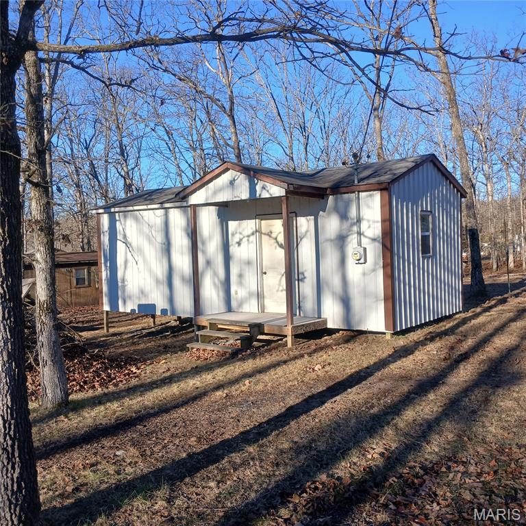 Nice lot located inside Lake Hannah. There is a small cabin on the property that is already hooked up to electric. There is not sewer or water hooked up to the cabin. You can see the lake from this lot!!