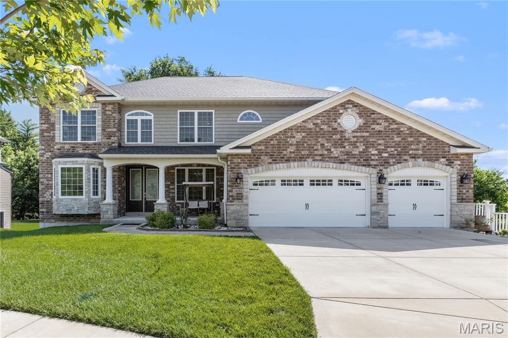 Don't miss the chance to own this exceptional 1.5 story 4 bedroom, 3 full bath home with a walk out basement in the desirable Harmony Meadow subdivision and sought after Parkway Central School District.  As you enter the sunlit foyer you will be greeted by an open floor plan with gleaming hardwood floors throughout the main level which includes a spacious dining room with arched entryway, a large office, a great room with soaring ceilings and a wall full of windows, a chef's kitchen, a main level bedroom for guests with a full bath right next to it for convenience and a main level laundry with plenty of storage space. The stunning kitchen is a dramatic focal point complete with granite countertops, center island, 42" custom cabinetry, a spacious pantry, breakfast bar, stainless steel appliances and a commercial grade hood that vents to the exterior. The spacious and cozy great room is open to the kitchen and has a gas fireplace with a beautiful granite surround. On the second floor you will find three more spacious bedrooms and a loft area that opens to a magnificent view of the great room below.  The master bedroom suite presents tray ceilings, large walk-in closet, and an opulent ensuite bath with a whirlpool jetted tub, separate glass shower, and dual vanities. Other two bedrooms share a convenient jack and jill bathroom. The spacious walk out basement includes a rough-in for a future bathroom and plenty of extra storage space. The backyard features a maintenance free composite deck and a private yard with wooded views. Upgrades include 9' doorways, 10' ceilings, an oversized 3 car garage, irrigation system and much more! With restaurants, grocery stores, hospitals, shopping nearby, close proximity to major highways, and prime Chesterfield location, what's not to love. This is a  MUST see!