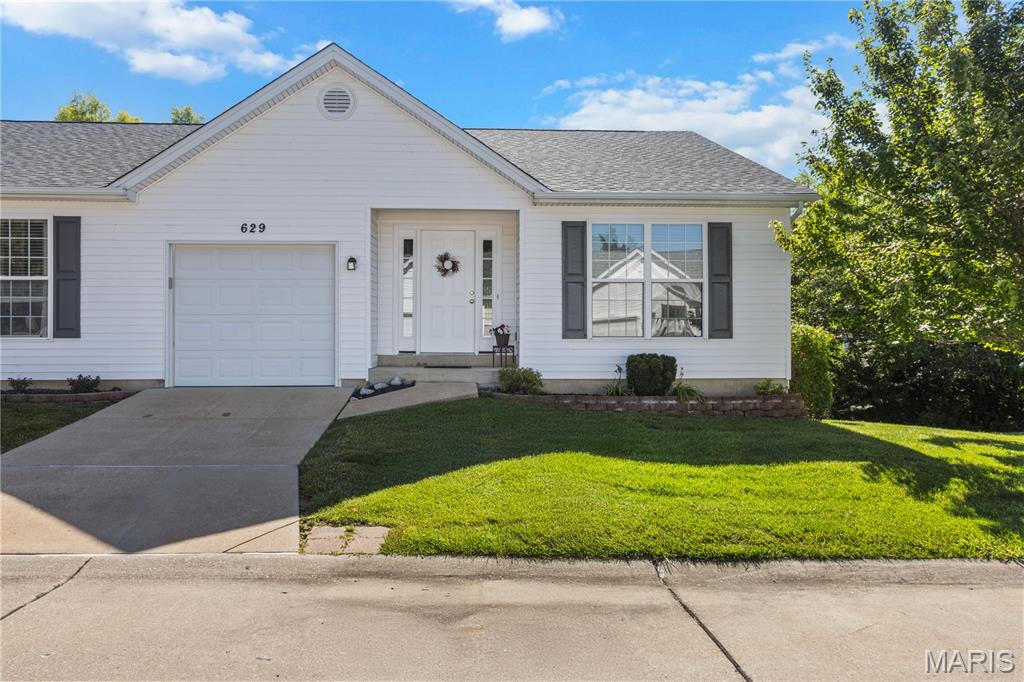 Fabulous & affordable age-in-place villa ready for its next owner!  This ranch has so much to offer and it begins outside-- with a field adjacent to the south, it's the ONLY home in the community without a neighbor on one side!  Inside, you can do all of your living on the main level, which features an entry foyer, an open floorplan with vaulted ceilings in the kitchen & great room, laundry closet, primary bedroom with full bath (which includes a walk-in shower with shower seat), a secondary bedroom with walk-in closet, and a hall bath with shower/tub combo.  The main level is not only highlighted by the private & relaxing covered deck backing to trees, but also the kitchen which showcases a pantry, ample cabinet & counter space, and new stainless steel appliances-- all of which stay with the home!  The finished walk-out lower level nearly doubles the home's livable square footage and offers ceramic tile floors, a half bathroom, plenty of storage space, and a covered patio.  Don't forget:  1yr old roof, 1 car attached garage, newer water heater, and newer Culligan water softener. Want more?  Washer & dryer, and secondary refrigerator and microwave in the storage space all stay with the home!