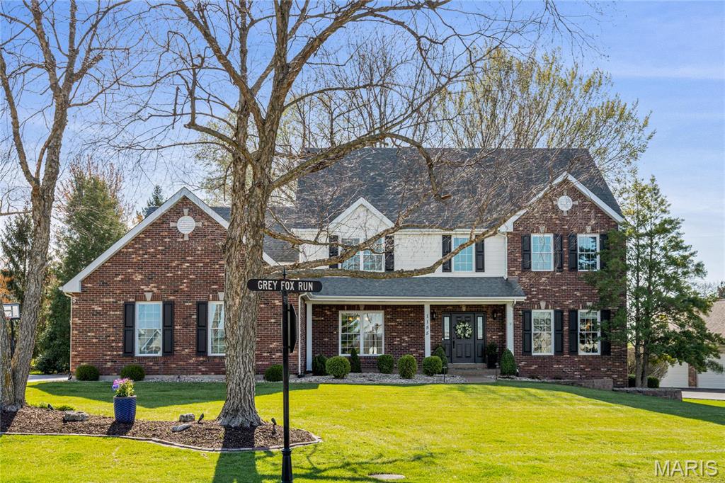 Golf community lifestyle. This extensively renovated brick 1.5 Sty features 5200 sf of living space enhanced by soaring ceilings, detailed trim work, designer lighting & oak hardwoods that extend throughout the main floor. Impressive 2-sty foyer leads to formal dining room & spectacular great room with wine bar, built-in bookcase & stacked stone fireplace flanked by 2-sty palladian windows. Vaulted kitchen with 42” white cabinetry, quartz countertops, stainless steel appliances & 8’ center island adjoins light-filled breakfast room with sliding glass door that opens to patio. Primary bedroom suite with beautifully appointed bath with freestanding tub offers an appealing retreat. The 2nd floor extends the living quarters with 3 additional bedrooms, 1 with ensuite bath & 2 with Jack n’ Jill bath. Lower Level includes recreation room with wet bar & floor-to-ceiling fireplace plus workout room, office & full bath. Situated on parklike .54 ac grounds with patio with pavilion & 3-car garage.