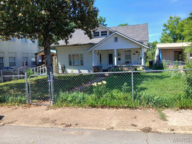 Take a look! This 2/3 bedroom home sits in the downtown historic district of Doniphan. With the chain link fenced perimeter, a 10x18 portable storage shed with electric and an extra storage shed in the back yard, you'll have ample storage and a yard for the dogs or kids. with a new roof in 2017, new plumbing in 2018, blown in solar insulation in the attic in 2018 and complete new wiring in 2008, this house is a bargain at only $79,900! Call NOW!