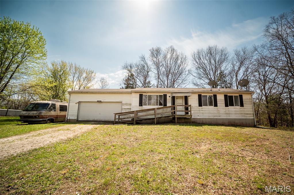 This property is ideal for those looking to add sweat equity. Its unfinished basement and as-is sale condition present an excellent opportunity for handy individuals or investors. The home is a perfect candidate for a handyman seeking a project or for inclusion in an investment portfolio.