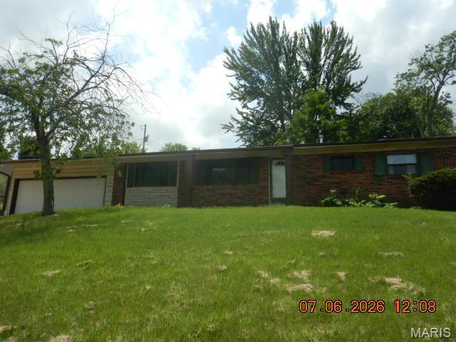 Don't miss this ranch style home with an attached two car garage and four bedrooms on the main floor! Special features include partially finished basement, four bedrooms, two full baths, some updates to the bathroom, flooring updated, full partially finished basement and much more!. Patio in the back of the house, partially fenced yard, vinyl siding and two car garage. Great opportunity to make your own. Set your appointment today!