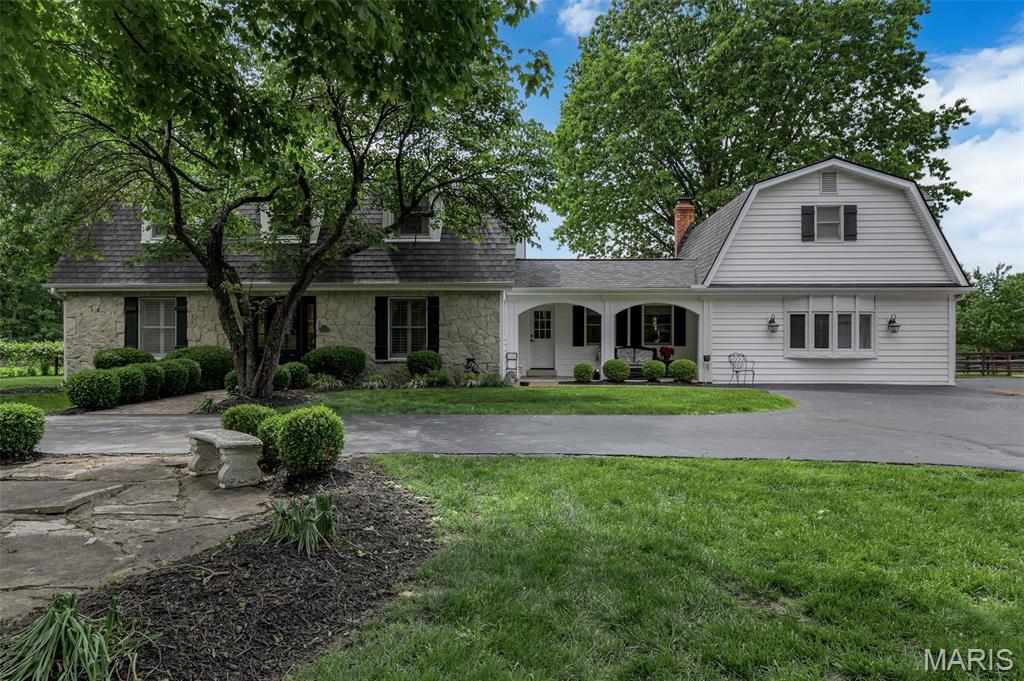 Unique Wildwood Equestrian Estate – 7 Acres, 8-Stall Barn, Riding Arena with Direct Access to Miles of Trails in Greensfelder Park
A truly exceptional equestrian estate set on 7 private acres in Wildwood. Opportunities of this caliber—where trail access, functionality, and setting align—are exceedingly rare. Thoughtfully designed for both horse and rider, this purpose-built property features a well-appointed 8-stall barn with Dutch doors, a tack room and grain room with electric and hot/cold water, a hay loft, four paddocks, and a dedicated outdoor riding arena. The acreage is fenced and cross-fenced, creating a seamless environment for training, leisure riding, and everyday equestrian care.
The two-story residence offers over 3,400 square feet with 4 bedrooms and 3 baths, blending comfort with scenic surroundings. Inside, enjoy hardwood floors and heated stone and tile floors on the main level and a well-appointed kitchen featuring custom cabinetry, an island, and solid surface countertops. A light-filled sunroom captures the natural beauty of the property year-round, while additional features include plantation shutters and main-floor laundry for everyday convenience.
Extensive updates provide long-term peace of mind, including a newer septic system and heat pump, a roof replacement in 2019 with a 50-year warranty, and insulated vinyl siding. An oversized 3-car garage with a workshop area adds both functionality and versatility. Offering a rare combination of location, land, and direct trail access, this property represents a unique opportunity for the discerning equestrian buyer seeking privacy, performance, and connection to one of the region’s most sought-after riding destinations. Located within the highly acclaimed Rockwood School District.