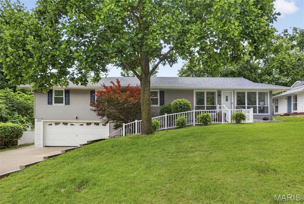 PRICE IMPROVED! Welcome to 1337 Aloha, a beautifully renewed 4-bedroom, 2-bath home in the heart of Crestwood, set within the coveted Lindbergh School District. From the moment you step inside, the home opens with an airy, connected floor plan designed for modern living.  The kitchen, dining, and gathering spaces flow together with warmth, ease, and natural invitation. At the center of it all is a newly renovated kitchen - both stylish and welcoming - featuring quartz countertops, modern cabinetry, and an oversized waterfall island made for morning coffee, casual dinners, homework, conversation, and effortless entertaining. Thoughtfully refreshed throughout, the home offers new lighting in every room, updated bathrooms, new LVP flooring, new carpet, fresh baseboards, and a new roof installed in 2024, blending fresh beauty with lasting peace of mind. With four bedrooms and flexible living spaces, there is room to grow, work, rest, and gather. Outside, the generous backyard offers its own quiet magic with space for play, gardening, summer evenings, fireflies, and connection beneath the open sky. Located near Crestwood parks, shopping, dining, and award-winning Lindbergh schools, 1337 Aloha offers the comfort of a beloved neighborhood with the ease of modern updates. A bright new chapter awaits.