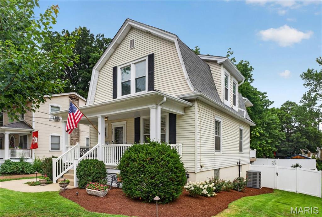 Built in 1905 and beautifully maintained through the years, 637 Atalanta Ave. is filled with the character and craftsmanship that make Webster Groves homes so special. A welcoming front porch sets the tone, leading to gracious living and dining rooms accented by hardwood floors, original millwork and abundant natural light. The beautifully updated kitchen is the centerpiece of the home, featuring custom cabinetry, granite countertops, stainless steel appliances and a large center island that makes everyday living and entertaining effortless. Just beyond, the inviting den opens to an expansive deck overlooking a surprisingly large, fully fenced backyard with room to play, garden and entertain. Upstairs, you'll find three comfortable bedrooms and a beautifully renovated full bath that blends timeless style with modern convenience. Whether you're hosting friends on the spacious deck, watching kids and pets enjoy the yard, or relaxing on the charming front porch, this home offers exceptional outdoor living from front to back. Lovingly cared for and thoughtfully updated, it's the perfect blend of historic character, modern comfort and the welcoming lifestyle that has made Webster Groves one of St. Louis' most cherished communities.