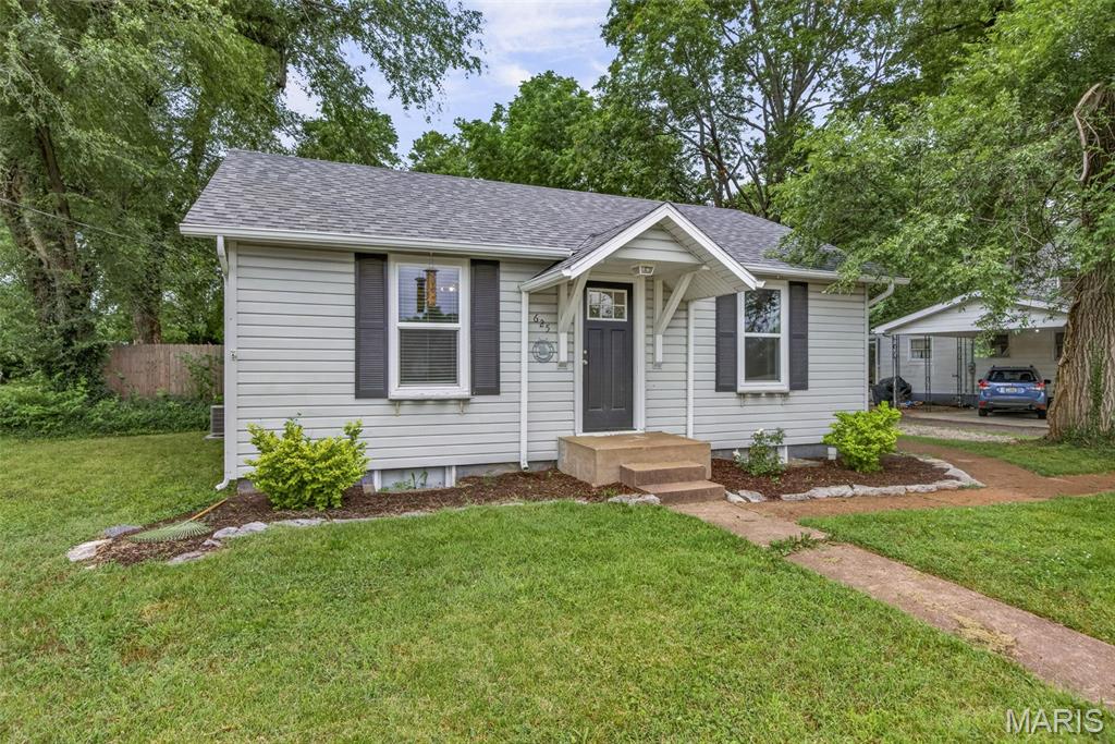 Adorable and move-in ready 2-bedroom, 1-bath home in the heart of Farmington! This charming property offers the perfect blend of comfort and convenience with an updated kitchen featuring stainless steel appliances, tile backsplash, and modern finishes. The updated bathroom adds to the home's fresh appeal.  Step outside to enjoy the huge, fully fenced backyard complete with a wood privacy fence, spacious deck, and swing set—perfect for entertaining, relaxing, or enjoying time outdoors. A detached 1-car garage provides additional parking and storage, while the full unfinished basement offers endless storage possibilities. Beautiful landscaping adds curb appeal and welcomes you home. Conveniently located close to schools, shopping, dining, and all that Farmington has to offer. Don't miss this wonderful opportunity!