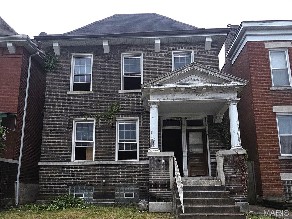 EXPERIENCED REHABBERS:  Here's your chance to transform a blank 2,560 sqft canvas in the heart of Tower Grove East, on the same block and walkable to Riley's Pub. This property is currently zoned as a two-family but was previously opened up to make a single-family residence, giving you multiple redevelopment options. The interior has already been cleaned out and substantially demoed, with no remaining systems or utilities, allowing you to design and build from the ground up without spending time or money on additional tear-out. Restore it as a stunning duplex, create a spacious single-family home, or pursue the layout that best fits your investment strategy.  Oh, but what stays?  Tons of exposed brick, beautiful windows and wood work and four fireplaces/mantles that you could choose to service and make operational! Tax credits should be a possibility for this project (but please make your own evaluation, we are not the authority nor the expert.  

Opportunities this clean and ready for redevelopment in Tower Grove East are increasingly difficult to find. The property is being sold AS IS, and the seller is looking for experienced investors who can make strong, straightforward offers and close quickly.

No utilities are on, new water service had been installed in recent years, there is no functioning plumbing, electric, HVAC or other items inside the property.  Absolutely NO seller financing or creative offers will be considered, so save us all some time and bring your all cash, hard or private money backed offer.

Helpful information (please use your own contractor for determining accuracy of these remarks, neither realtor or owner are qualified contractors and simply providing areas for your review):
 - There are 4 non functioning fireplaces in great condition
- 2 pocket doors in great condition as well as some woodwork
 - Windows were replaced in 2005 and are in decent condition
 - A gutter issue at the back of the property and small roof leaks have caused mild water damage on the back wall, requiring tuckpointing, we beleive that the majority of damage inside was to tongue and groove flooring and a few joists at the back of the property on the second floor.  
- Seller reserves the right to exclude bricks and shelving in the garage and intends to remove them prior to closing, but does not guarantee they will be removed.   The remainder of contents in the garage will largely remain in place at closing.
- NOTE:  Tour at your own risk - no major problems but exercise caution!!  While in the property please use the front stairs to access the basement, as there are two missing stairs in the back entrance.   s well there are a couple small places near the water damage where you should exercise caution not to step in a hole or floor.    The basement door is secured as well as others so please access the back yard by going around the house by the front..