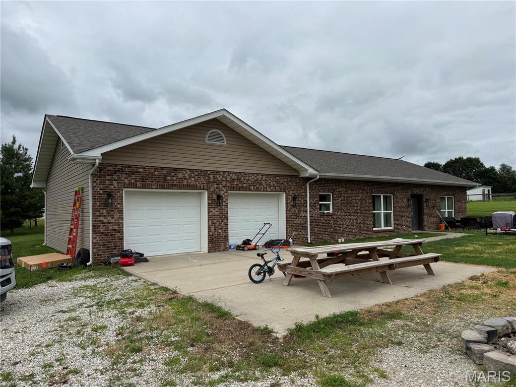 The subject property is located at Scratcher's Lake in Montgomery County.  The lake is a shared 20 acre fishing lake.   The annual dues are $200.   The road to the property is private with a $600 per year maintenance fee.
Propane tank is owned an provides gas to fireplace.